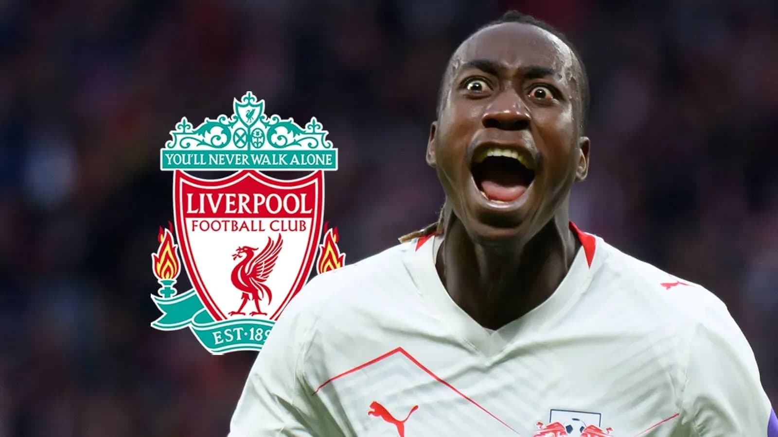 Futbolchi g'oyibning oldida Liverpool logotipi