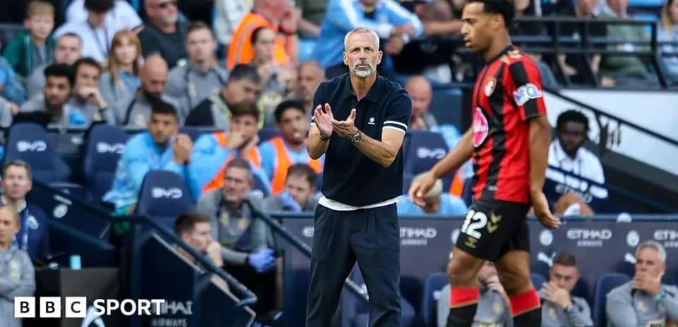 Bournemouth coach directing player during match