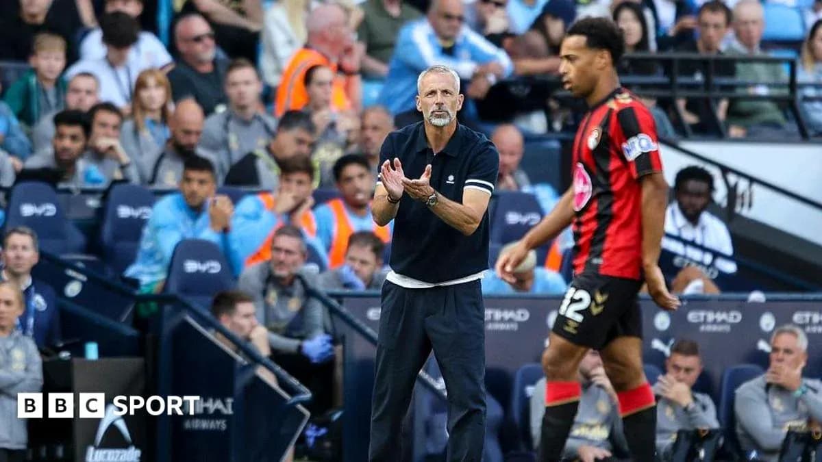 Bournemouth coach directing player during match