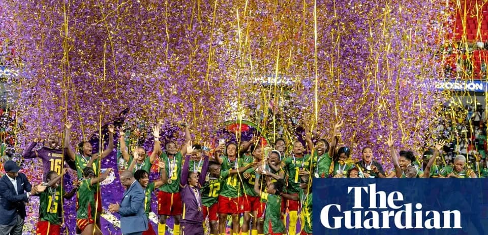 Cameroon team celebrating victory with confetti and medals