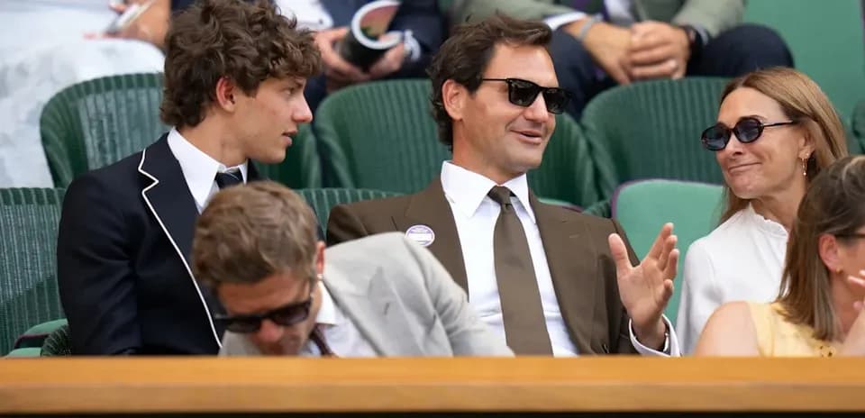 Group of people seated at Wimbledon event