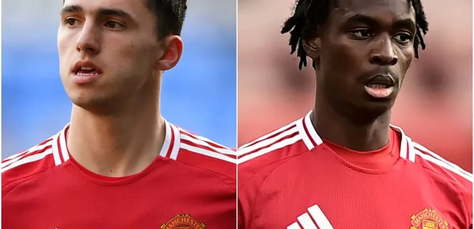 Two Manchester United players in red kits