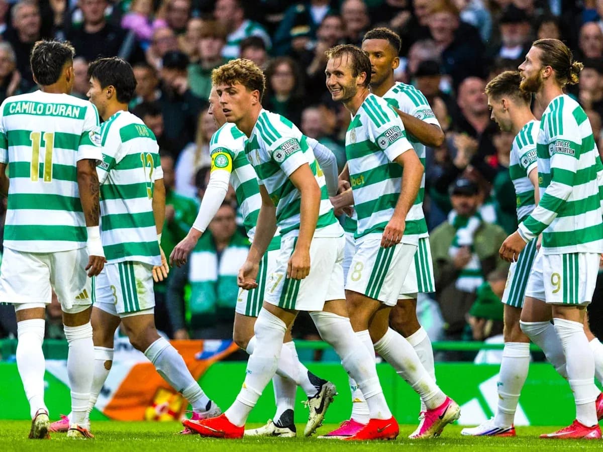 Celtic players celebrating a goal on the pitch