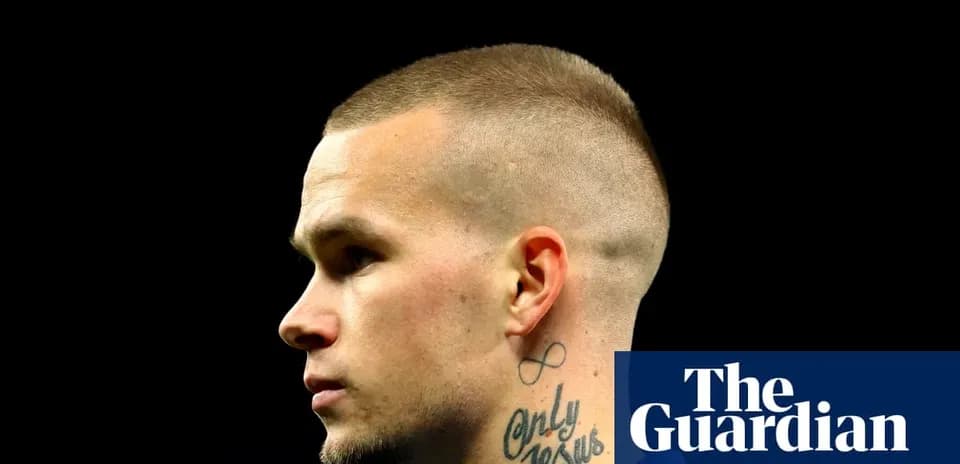 Yigit Kocak's profile with tattoo visible