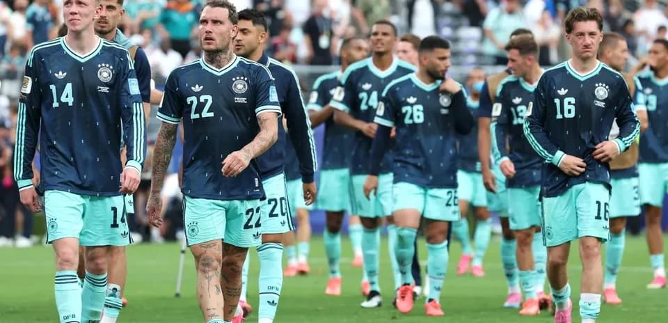 German football team walking off the pitch after match