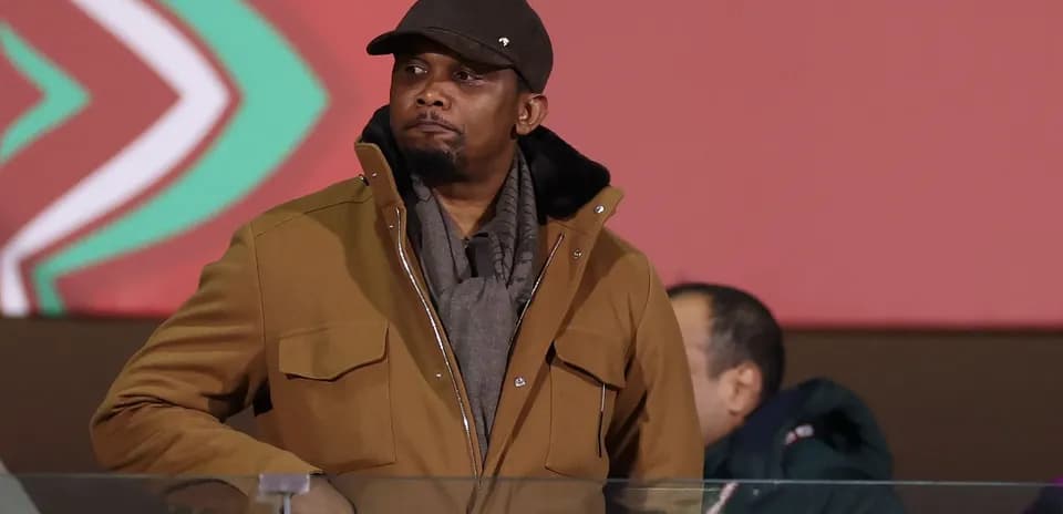 Man in brown jacket at an event