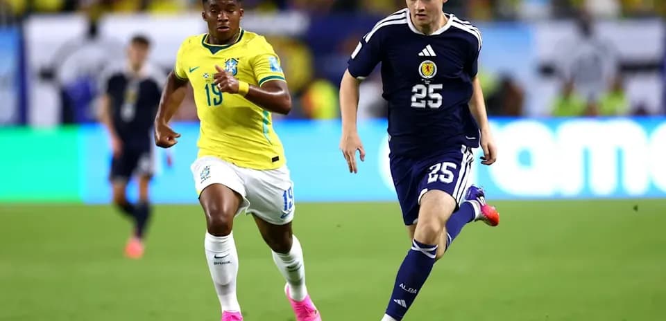 Two players sprinting during a football match