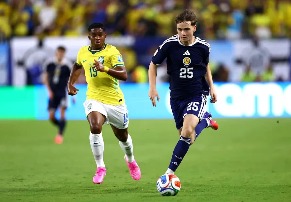 Two players sprinting during a football match