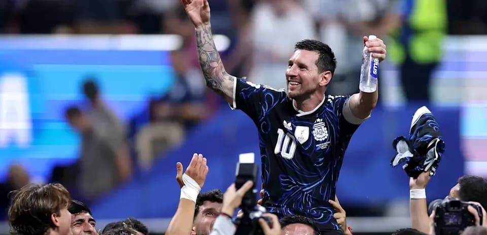 Lionel Messi celebrating with teammates after victory