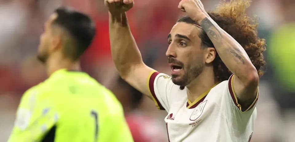 Player celebrating with raised fists during match
