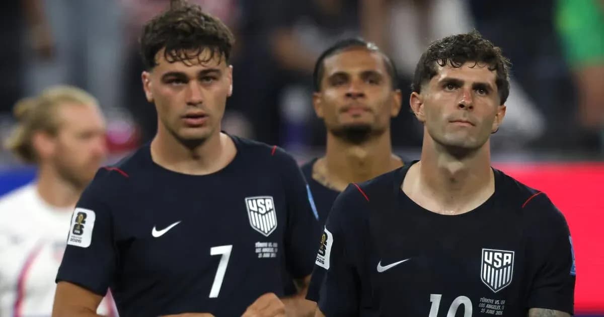 US men's national team players walking off field