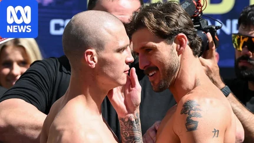 Two fighters facing off at weigh-in event