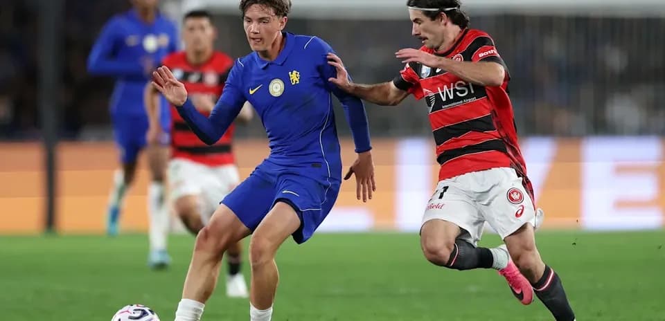 Two players competing for the ball during match