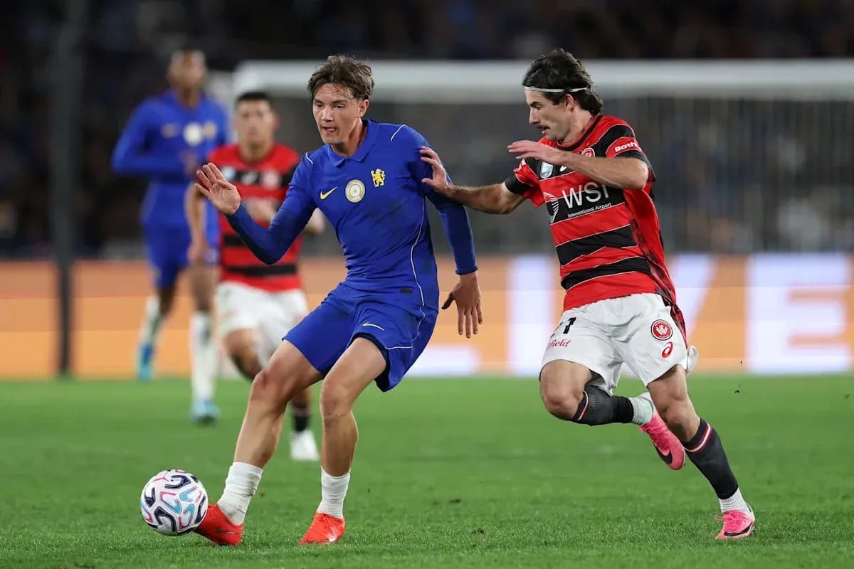 Two players competing for the ball during match