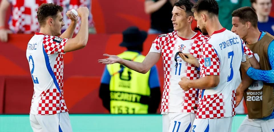 Croatian players celebrating on the field during match