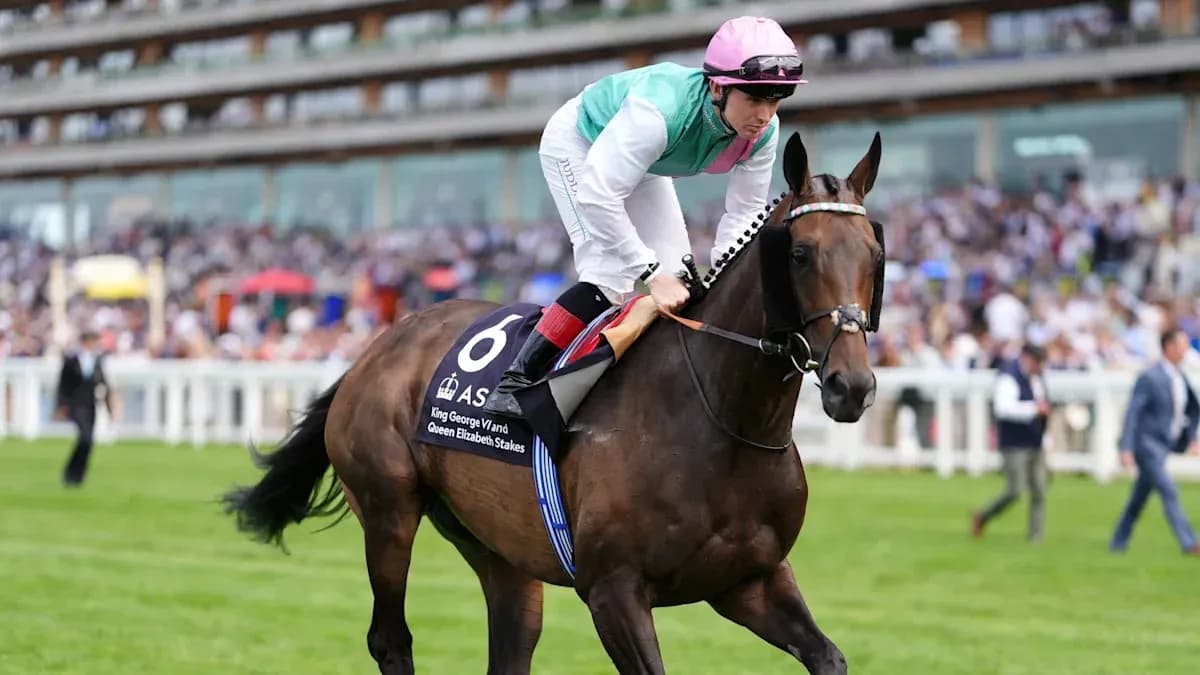 Jockey riding horse during King George VI race
