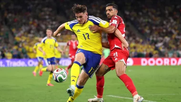 Two players competing for the ball during match