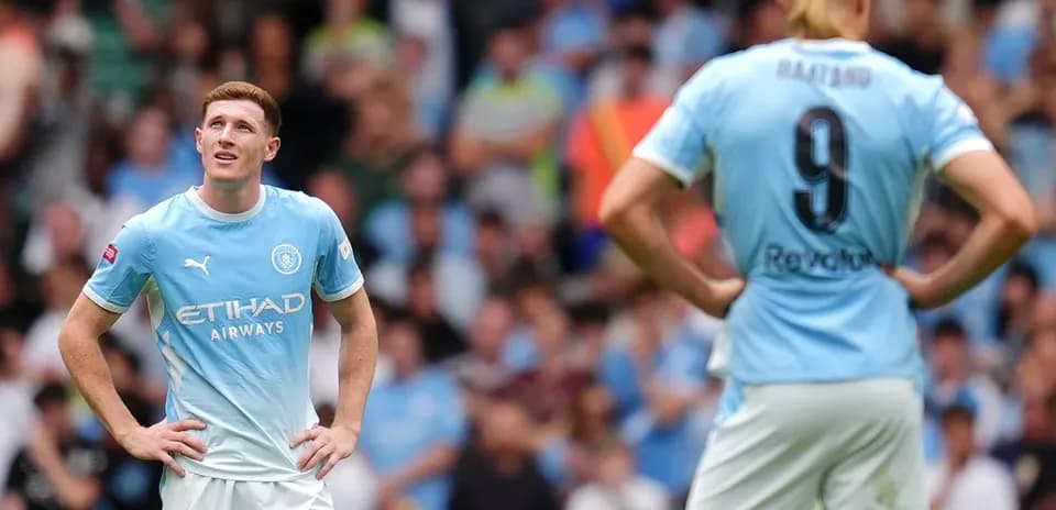 Manchester City players on the field during match