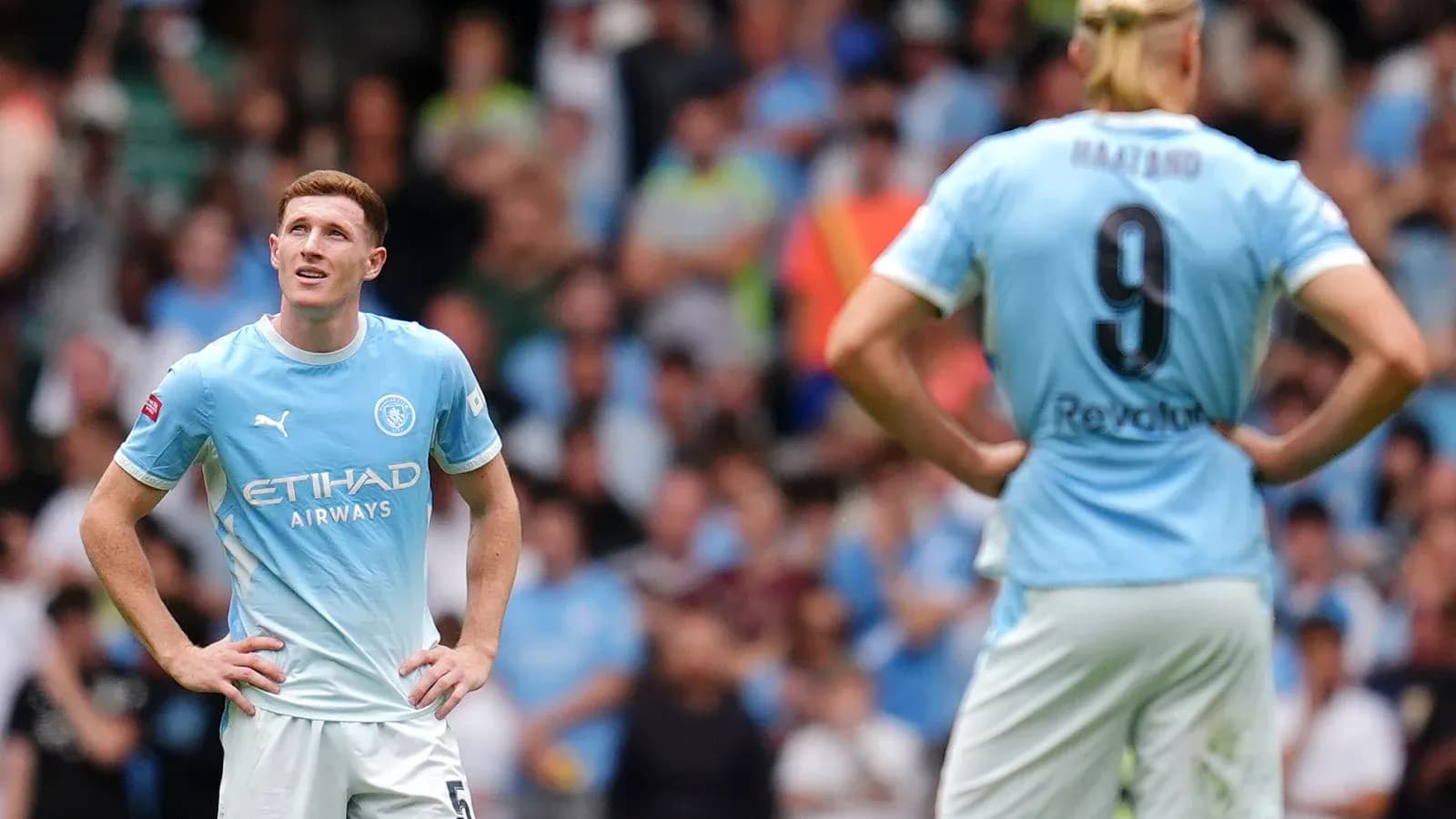 Manchester City players on the field during match