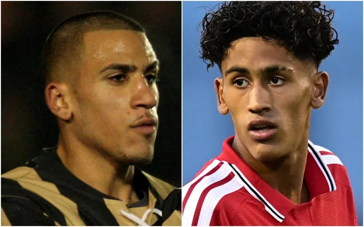Two football players in profile view