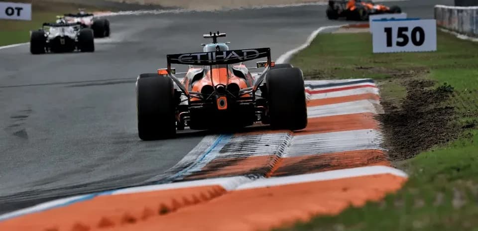 Formula 1 car navigating a corner on track