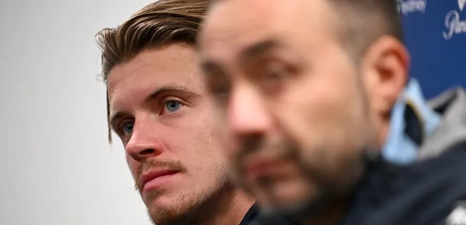 Player and manager during press conference