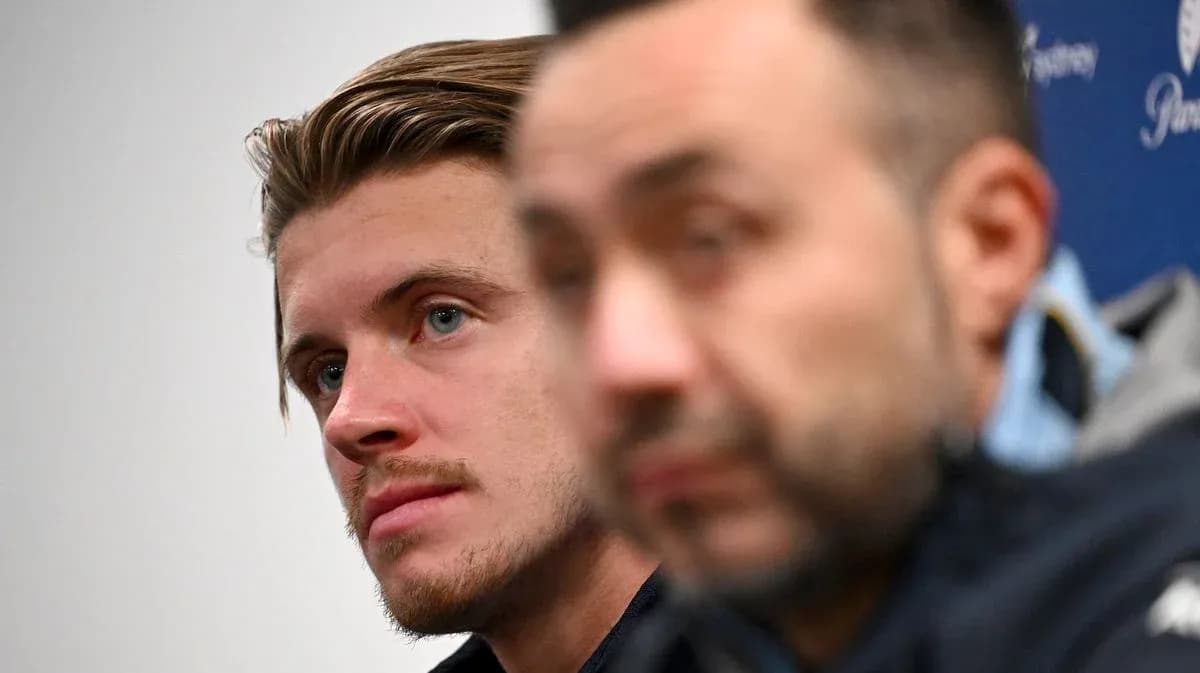 Player and manager during press conference
