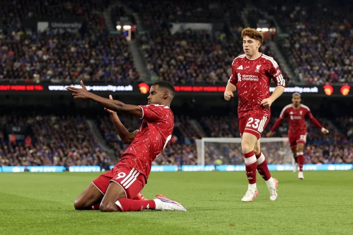Liverpool players celebrating during match at stadium