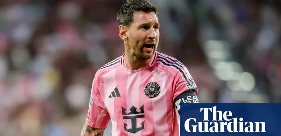 Lionel Messi in pink jersey during match