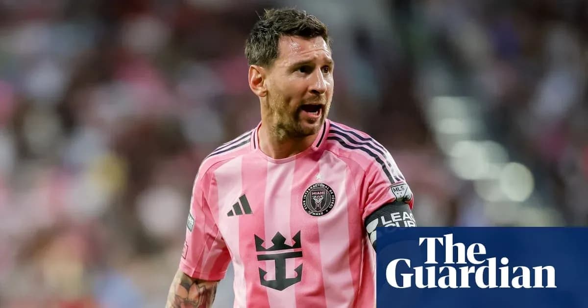 Lionel Messi in pink jersey during match