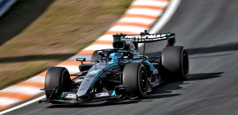 Mercedes Formula 1 car navigating a racetrack corner