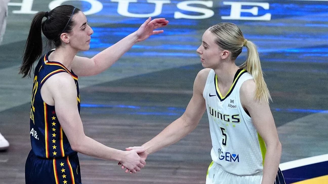 Basketball players shaking hands after a match