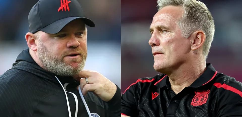 Two football managers during a match