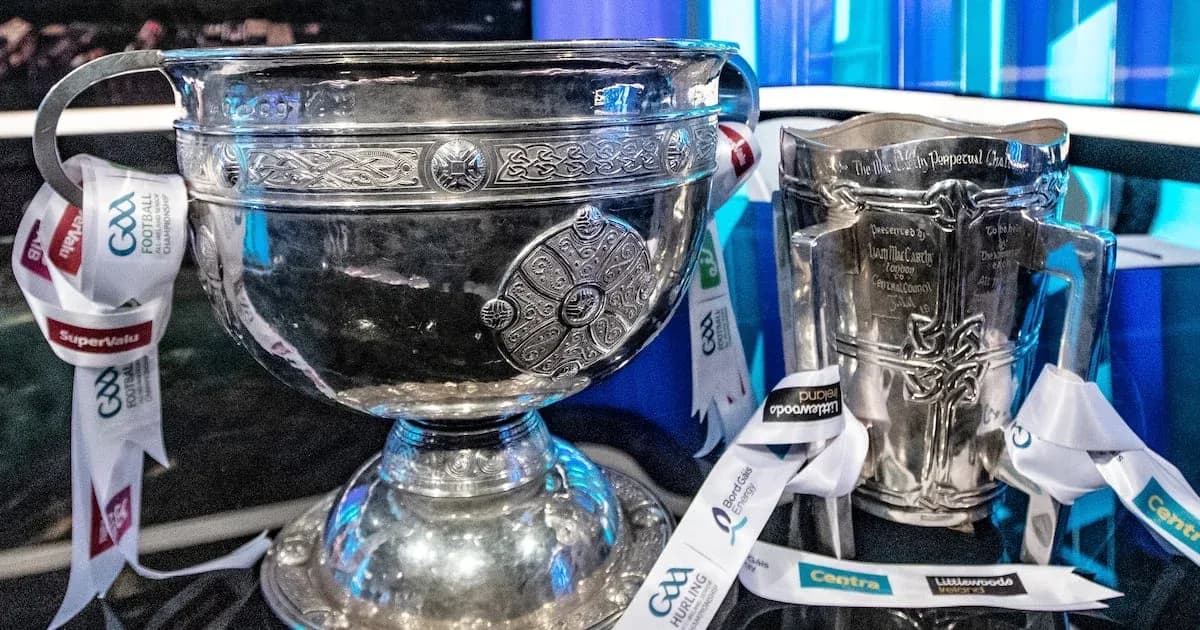 GAA trophies displayed with promotional ribbons