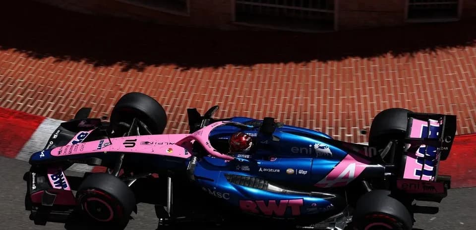 Formula 1 car racing around a corner