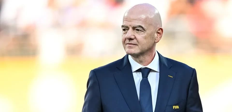 FIFA president in formal suit at event