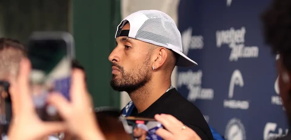 Athlete speaking to media with phones recording