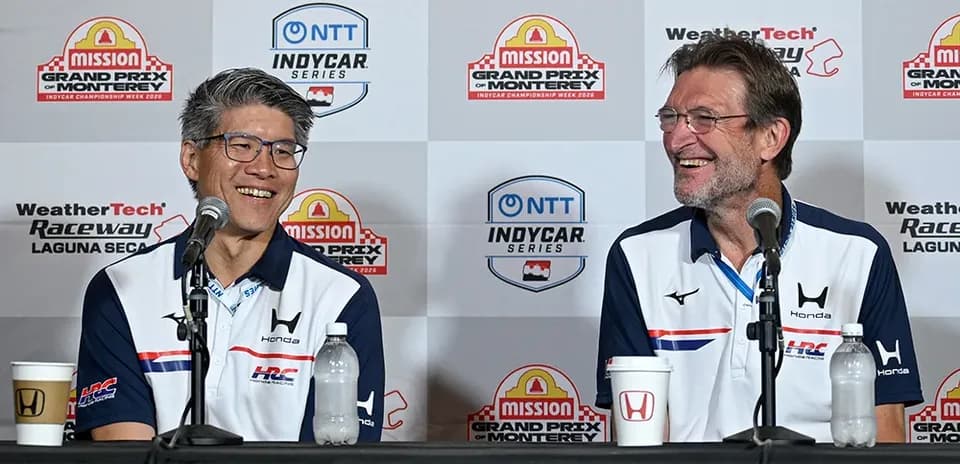 Two men at a press conference for IndyCar series