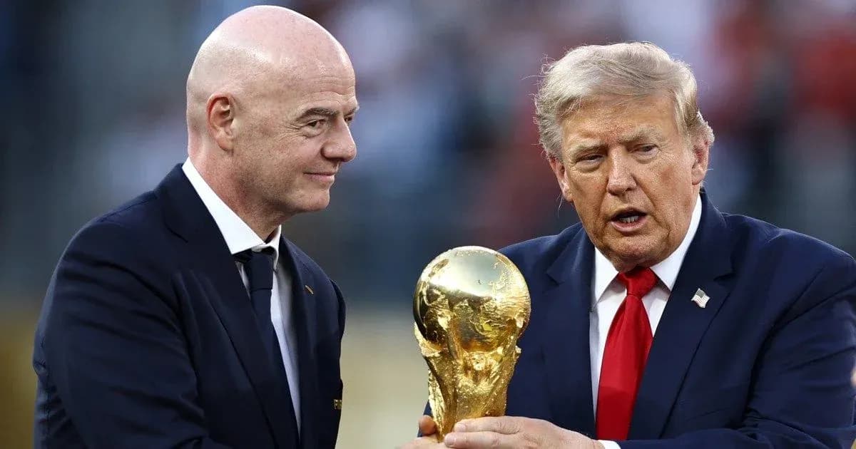 Gianni Infantino and Donald Trump with World Cup trophy