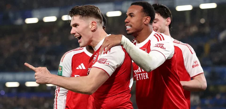 Arsenal players celebrating a goal during match