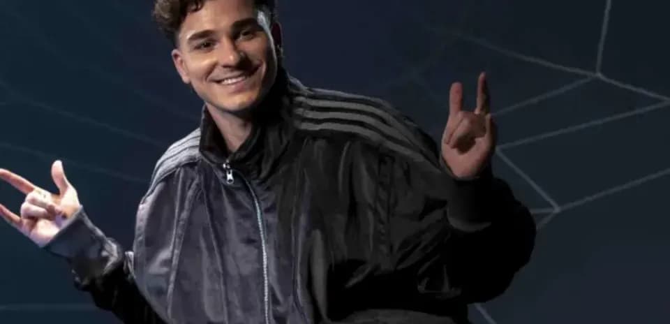 Young man posing in a black jacket