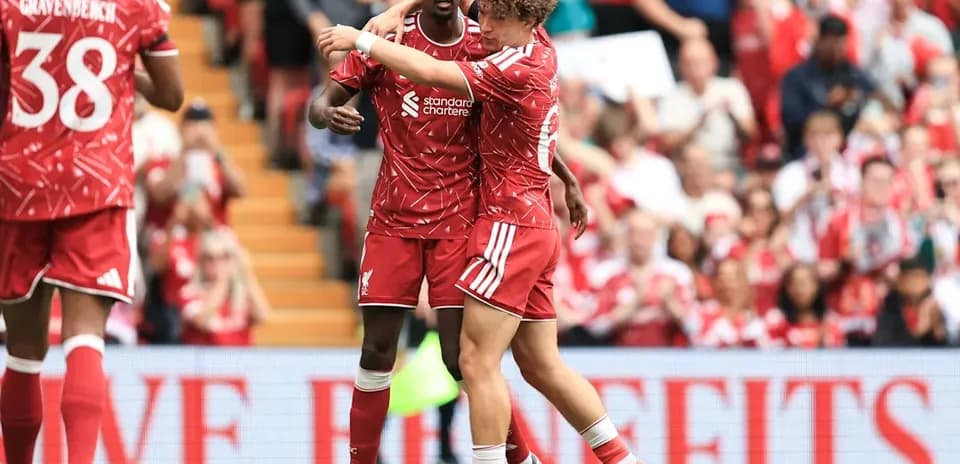 Liverpool players celebrating during a match
