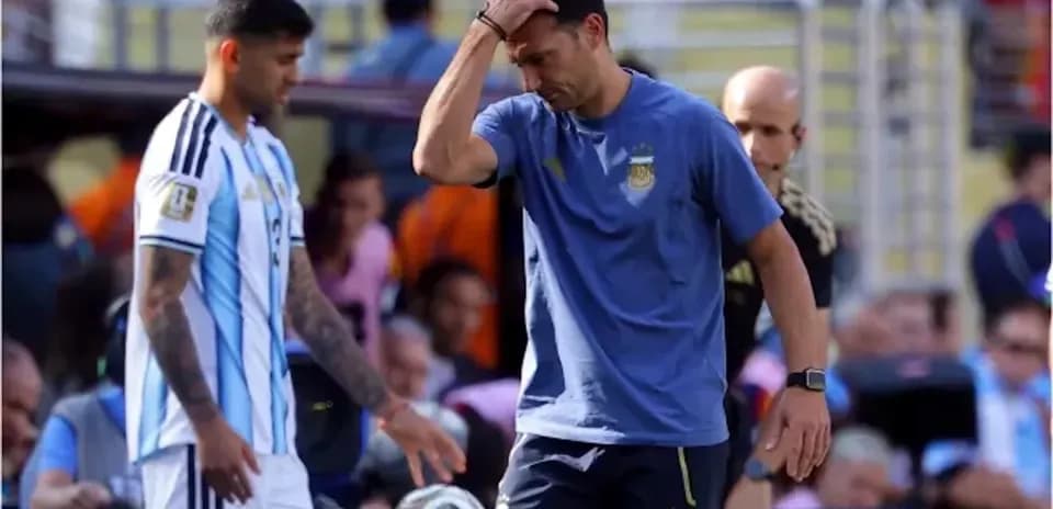 Argentina coach and player during match at stadium