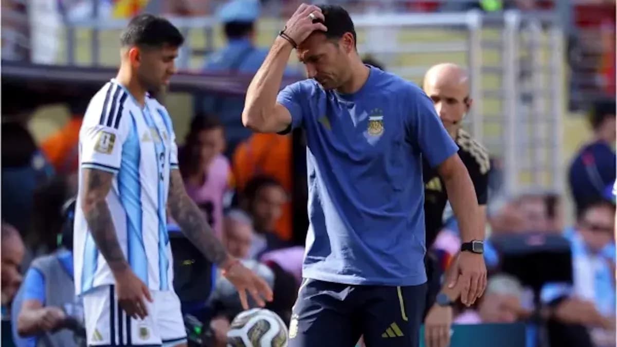 Argentina coach and player during match at stadium