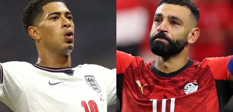 Two football players celebrating and reacting on field