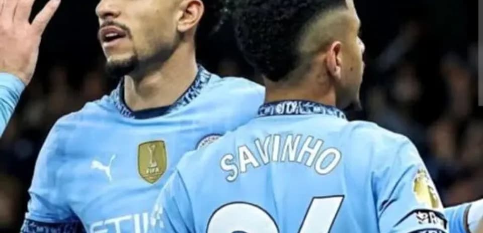 Manchester City players celebrating during a match