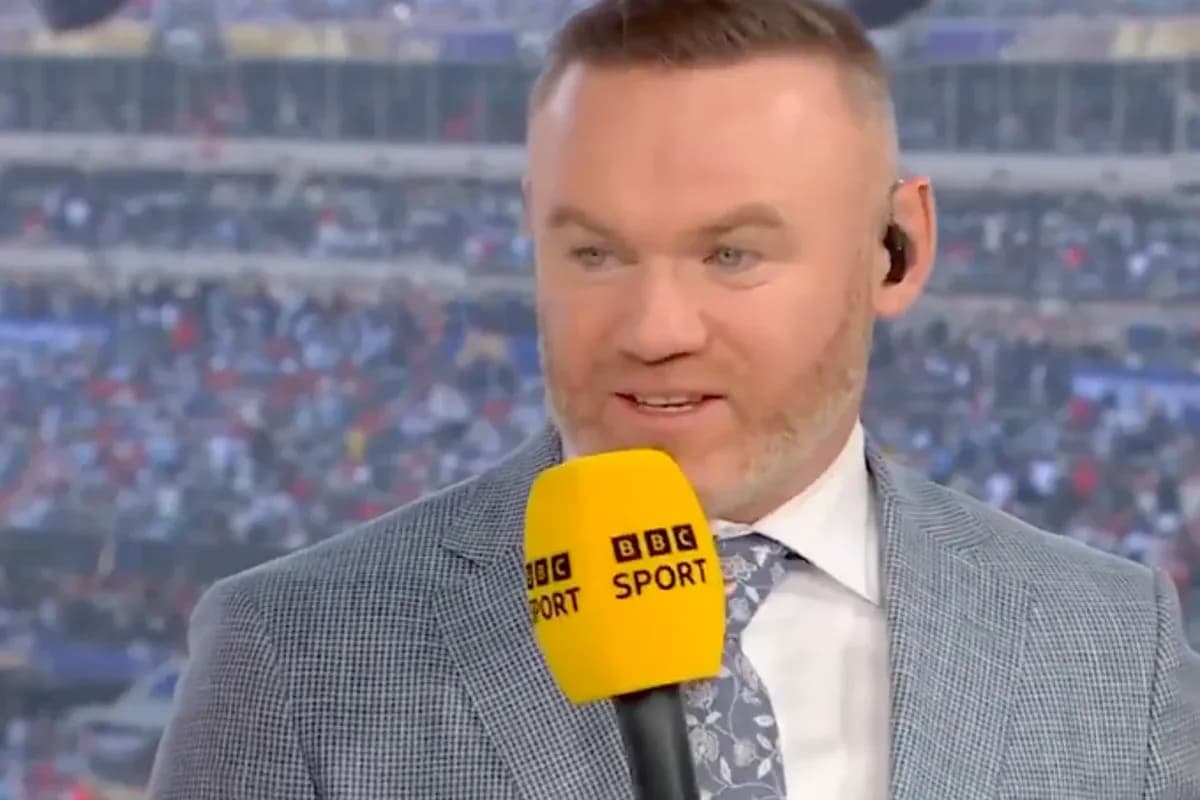 Analyst speaking into microphone during live broadcast
