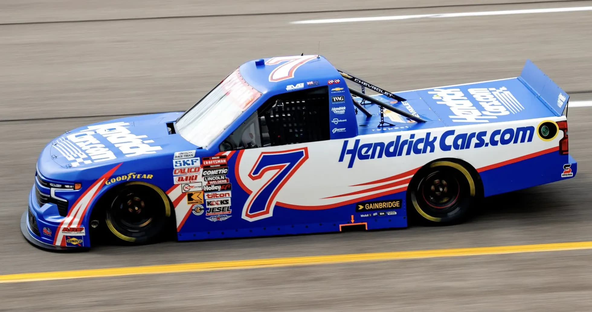 Hendrick Cars Chevrolet truck racing on track