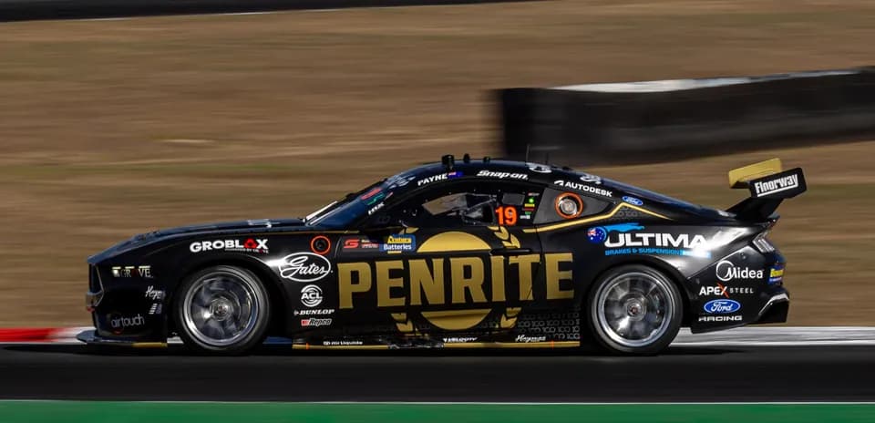 Penrite Racing car speeding on racetrack