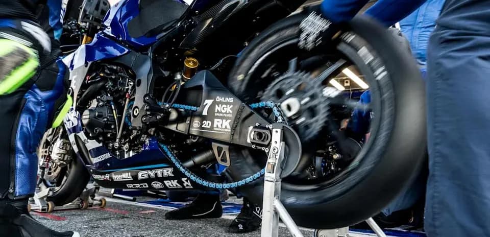 Motorcycle being serviced in the pit area